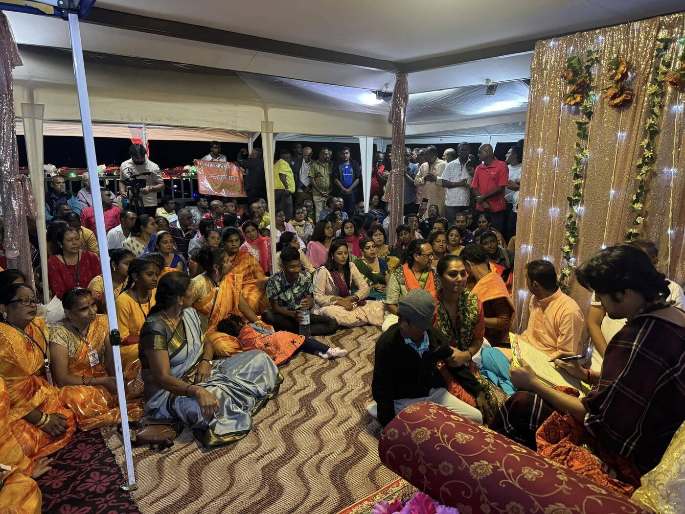 Devotees gathered at the darbar hall