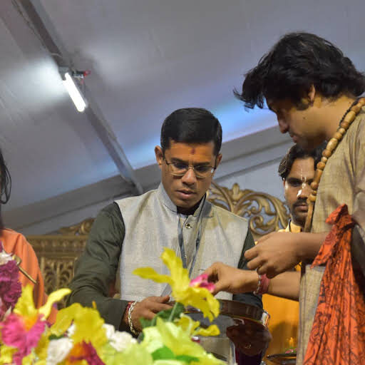 Sacred thread blessing a devotee